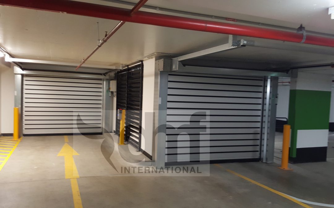 High speed carpark doors for low head room applications